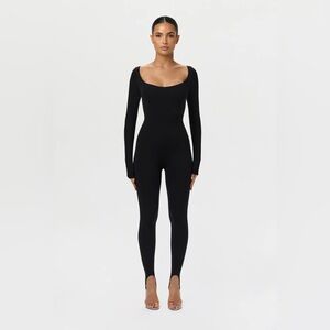 Naked Wardrobe Scoop Stirrup Jumpsuit / Black Long Sleeve Bodysuit